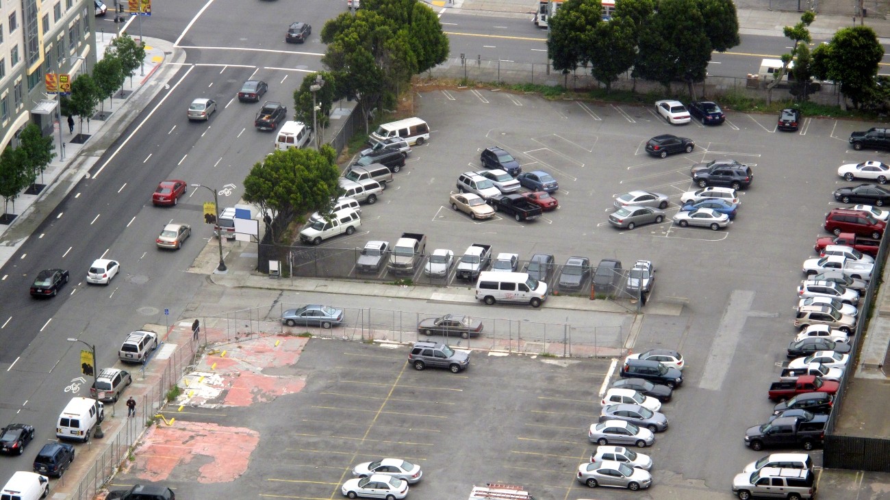 A parking lot with many empty spaces