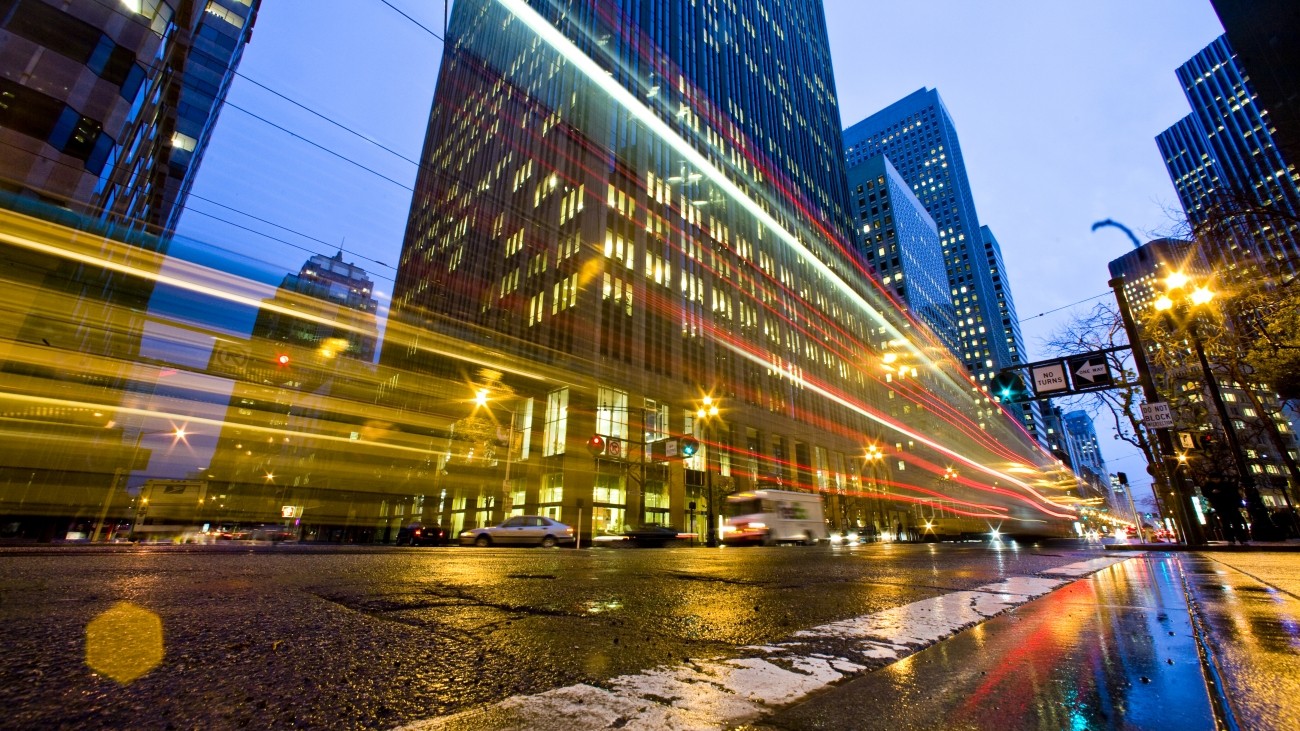 A streak of light depicting a bus moving at night