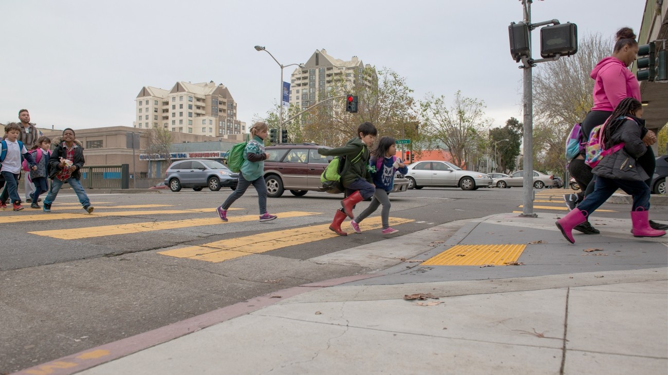 kids crossing a street