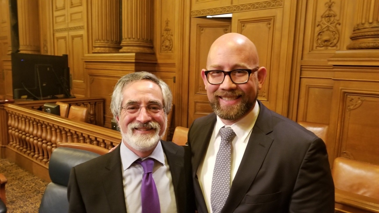 Aaron Peskin and Rafael Mandelman at a Transportation Authority Board meeting in January 2019