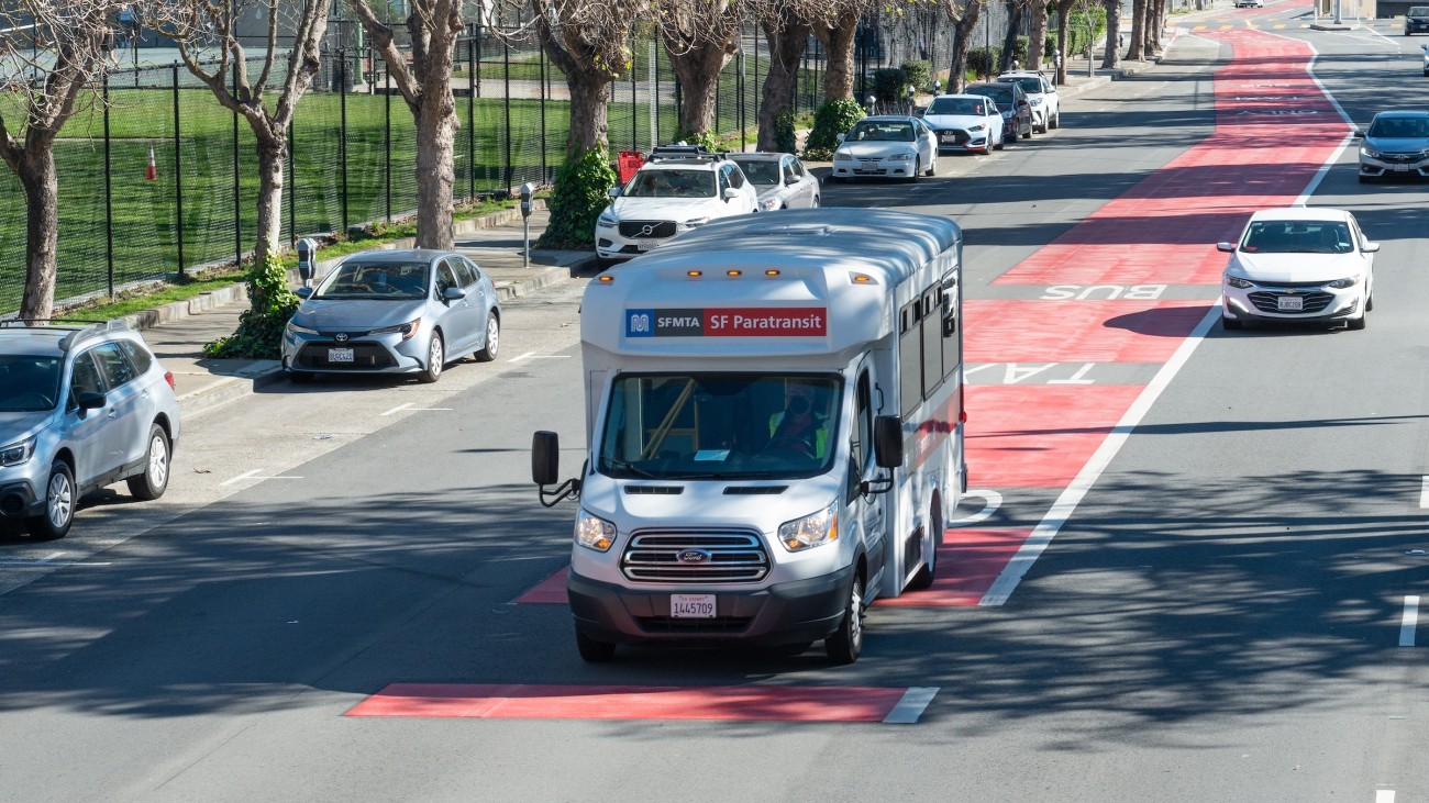 SF Paratransit bus along roadway in San Francisco