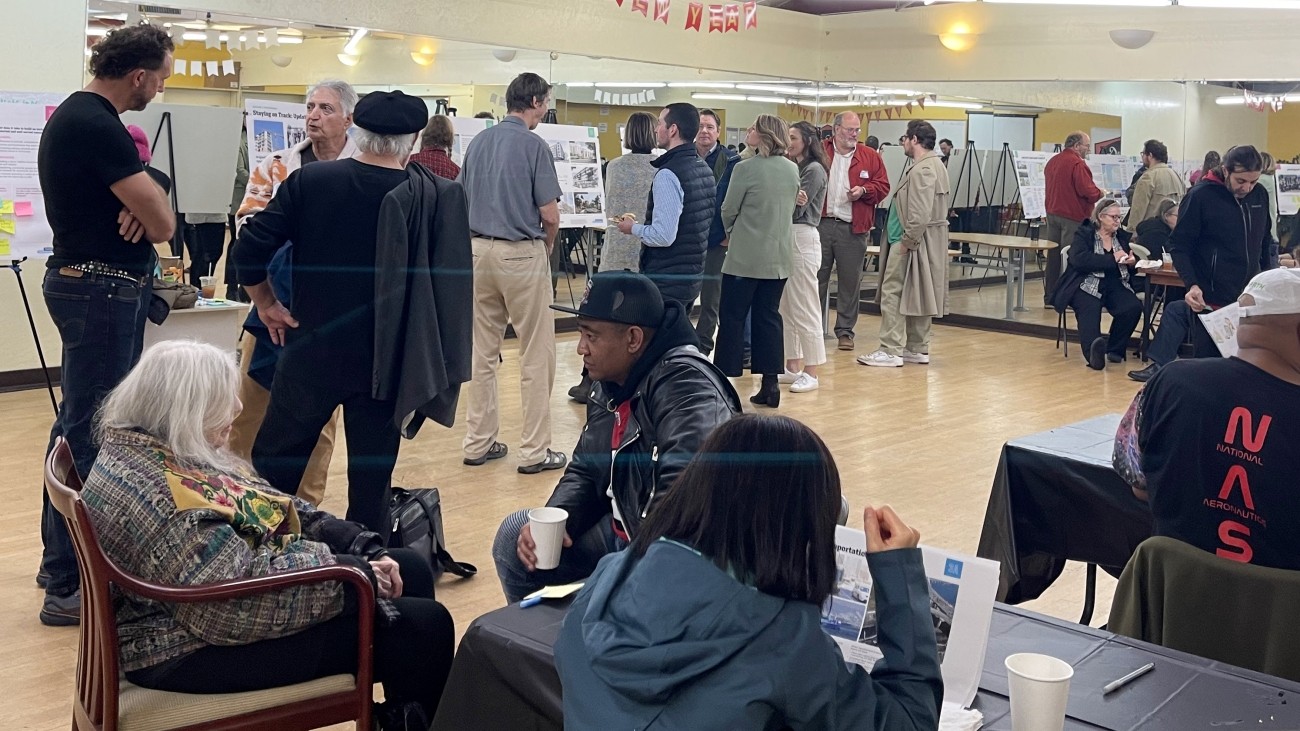 Project staff taking feedback from residents at an open house on January 20, 2024.