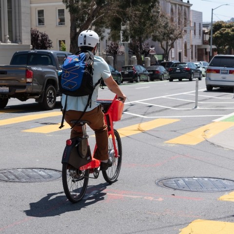 A person using New Bike Lanes on Howard Street
