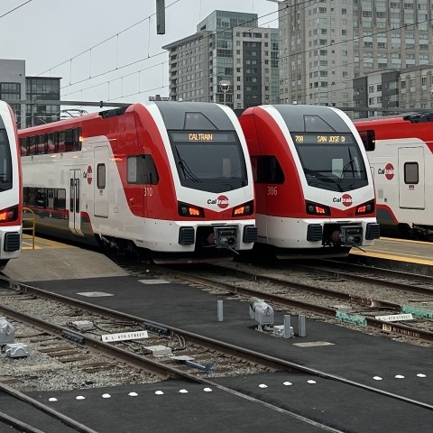 Four new electric trains lined up on the tracks 